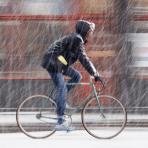 person biking Minneapolis winter